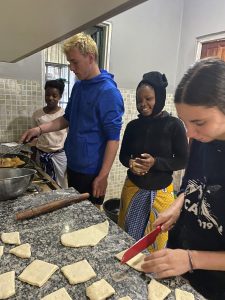 maxellie making mandazi