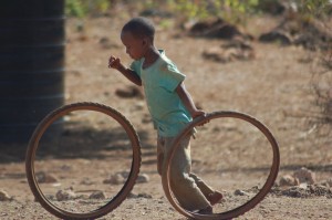 Boy rolling wheels