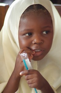 Girl w new toothbrush